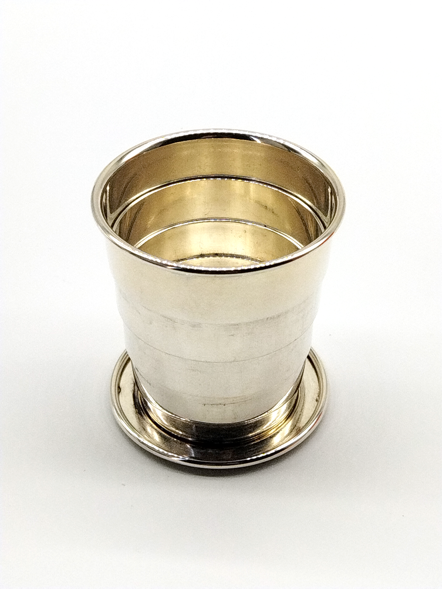 HERMÈS, RARE SILVER PLATED COLLAPSIBLE CUP & LEATHER CASE WITH BOX.