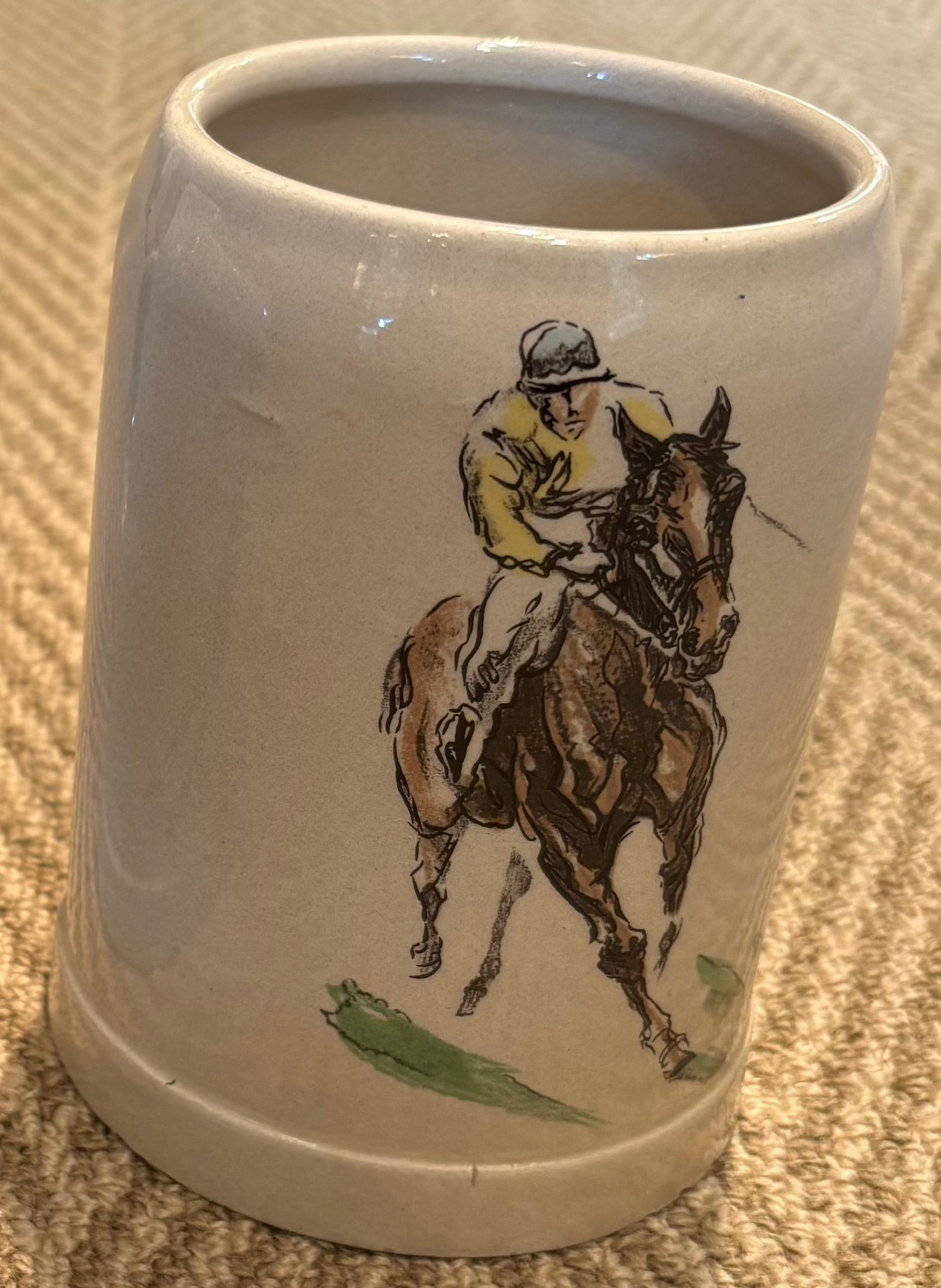 LOWENBRAU MUNCHEN, RARE STONEWARE BEER STEIN WITH HORSE & JOCKEY MOTIF, HEIGHT 13cm.