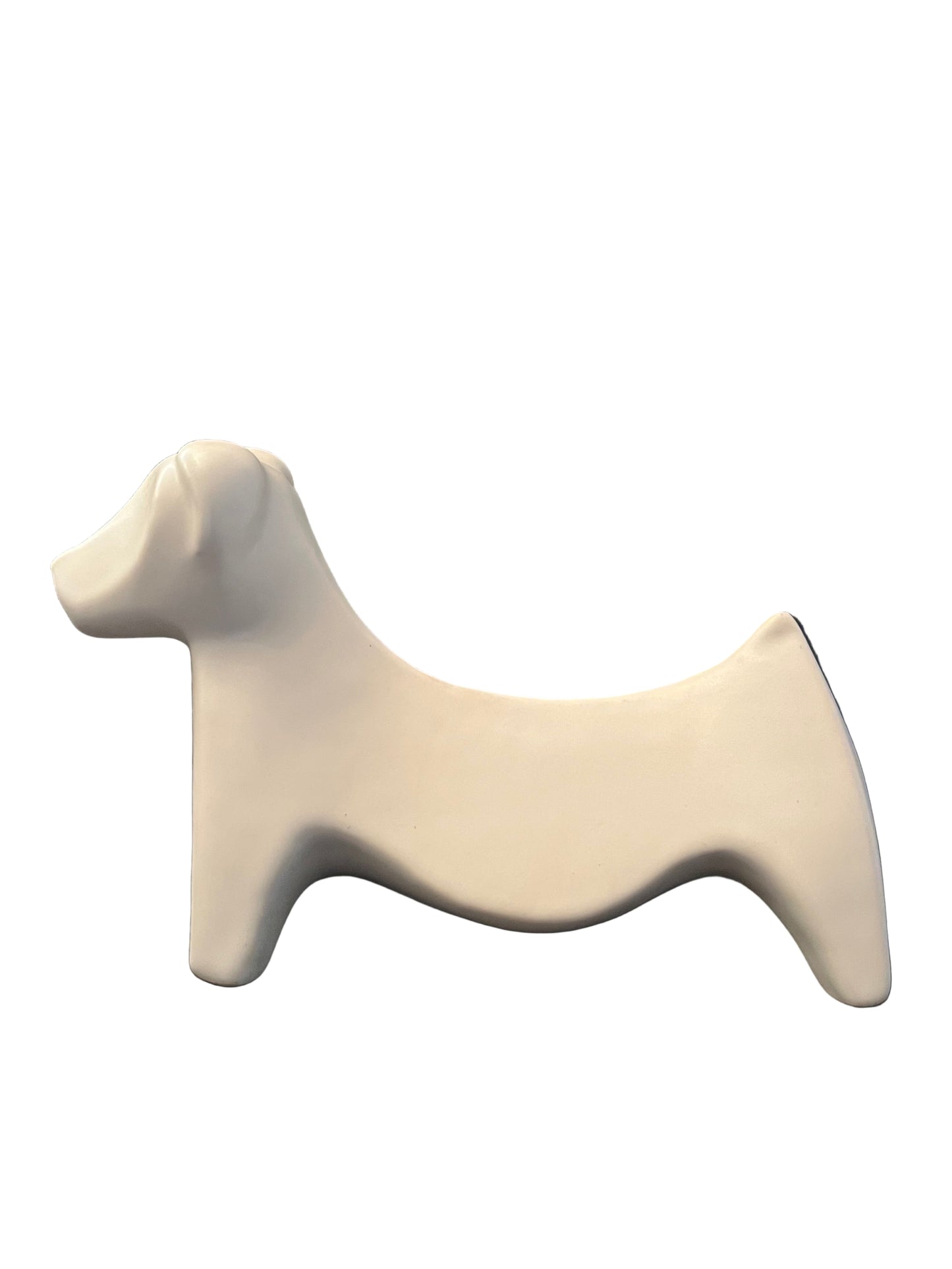 AN ART DECO STYLE WHITE CERAMIC FIGURE OF A DOG, HEIGHT 12cm, LENGTH 20cm.