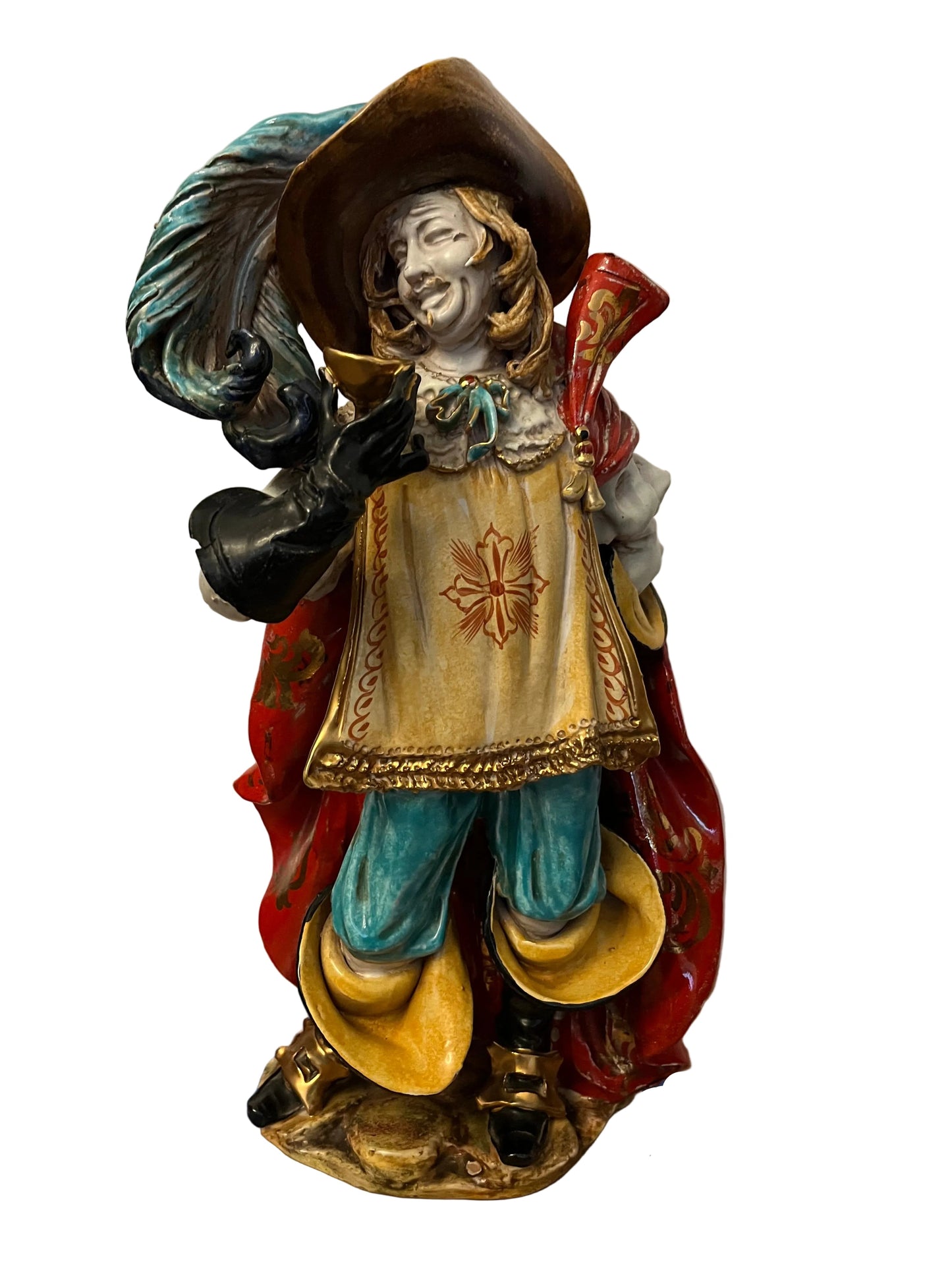 A POLYCHROME TERRACOTTA FIGURE DEPICTING A MUSKETEER, ATTRIBUTED TO THE STUDIO OF EUGENIO PATTARINO, (1885-1971), HEIGHT 40cm.