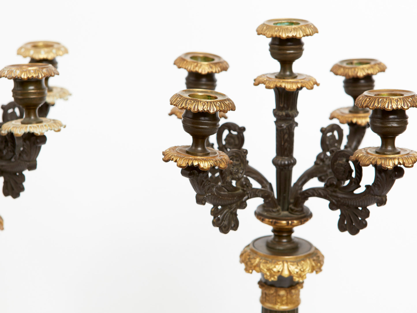 AN IMPRESSIVE PAIR OF NAPOLEON III EMPIRE FIVE BRANCH CANDELABRA