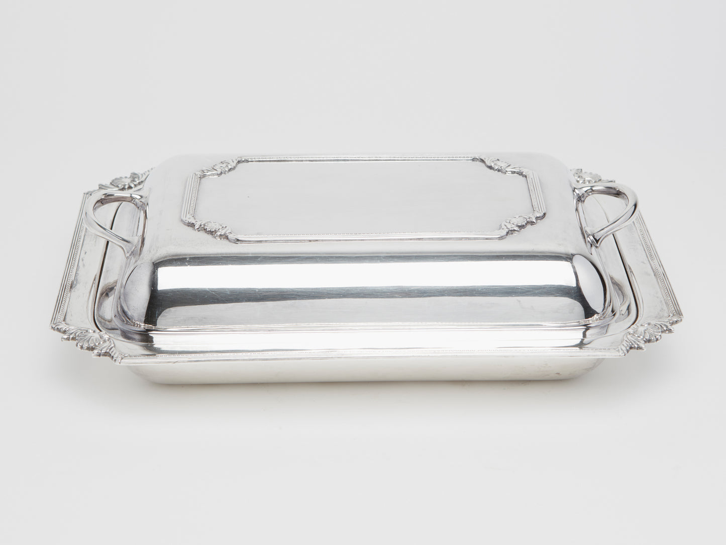 A PAIR OF ANTIQUE RECTANGULAR LIDDED SERVING DISHES