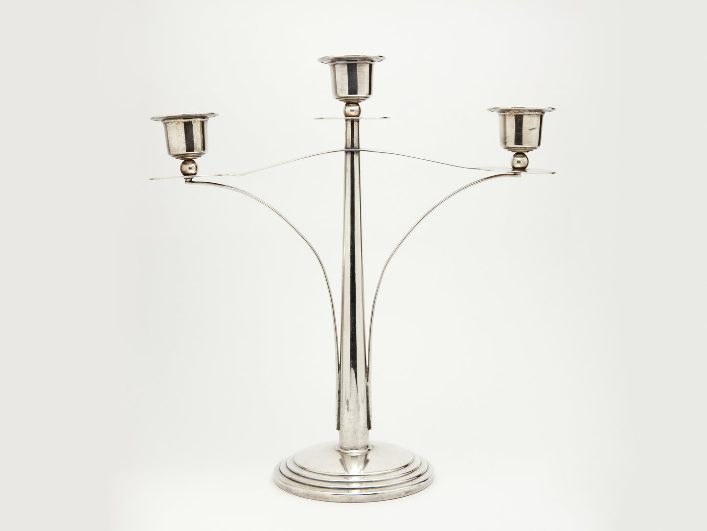 AN ART DECO CHROME PLATED THREE BRANCH CANDELABRA , CIRCA 1930