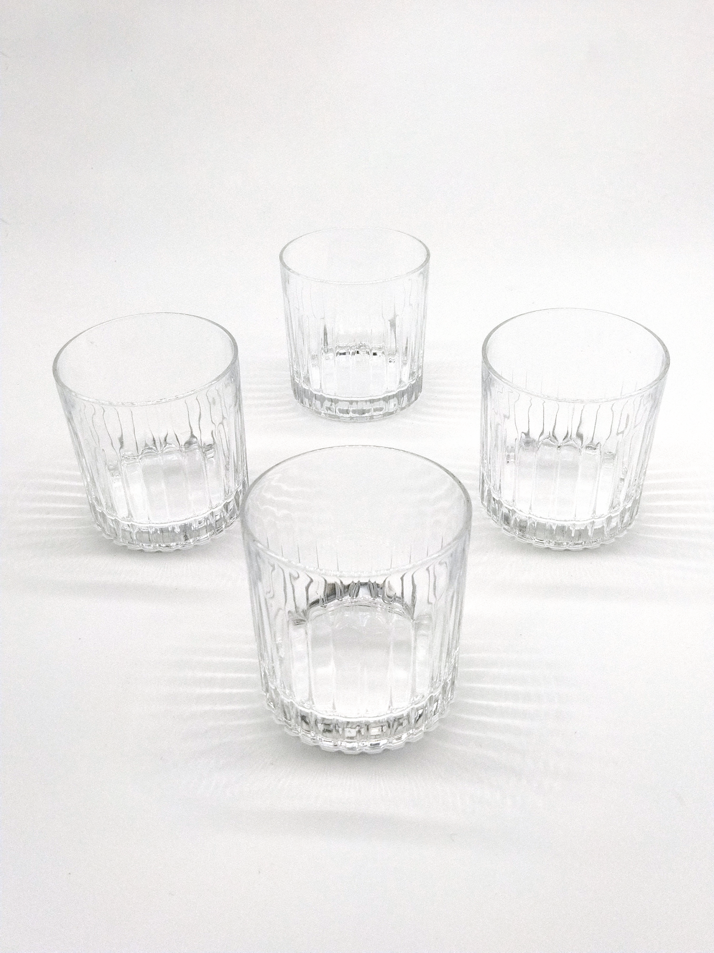 SET OF FOUR ROYAL DOULTON WHISKEY TUMBLERS, DIAMETER 8cm, HEIGHT 9cm.