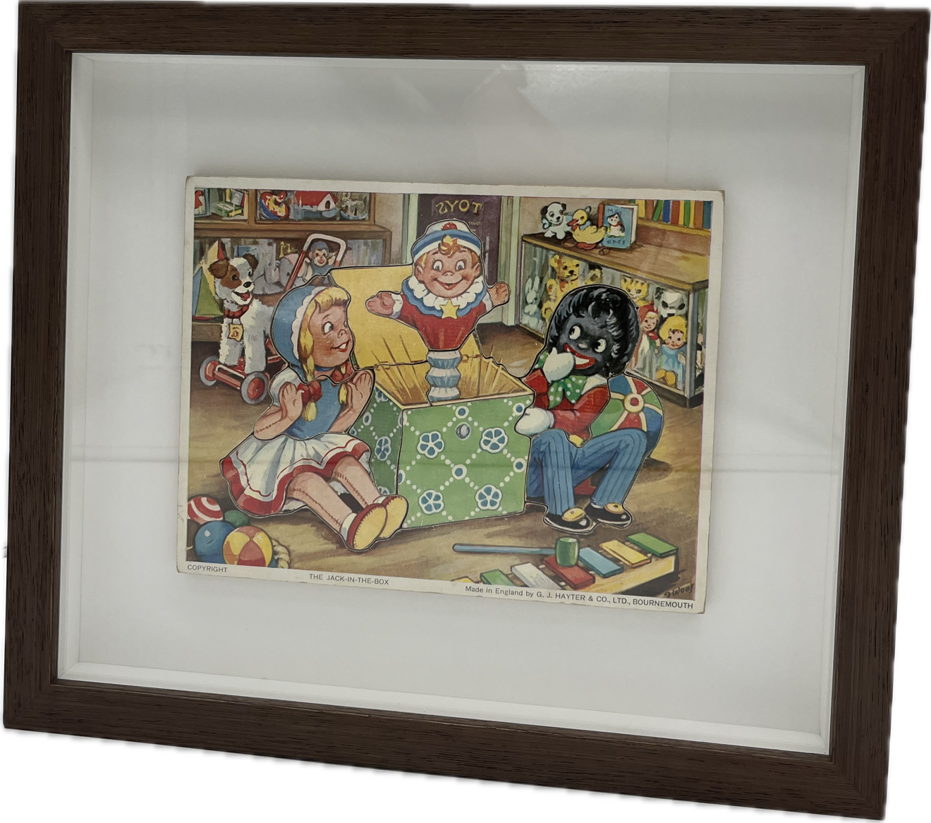 FRAMED JACK IN THE BOX WOODEN PUZZLE, FRAME 34 x 30cm.