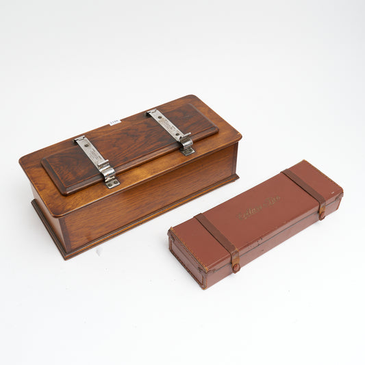 AN ANTIQUE OAK BOX WITH TIE PRESS LID, AND COLLAR AND TIE BOX LEATHERETTE CASE INSERT, RETAILED BY AUSTIN REED LTD, LONDON, CONTAINS ADDITIONAL BOX, 42 x 19 x 12cm.