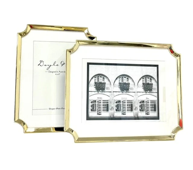 DOYLE & Co, PICTURE FRAME, GOLD METAL WITH CLIPPED CORNERS & BLACK VELVET BACK, 12 x 17.5cm
