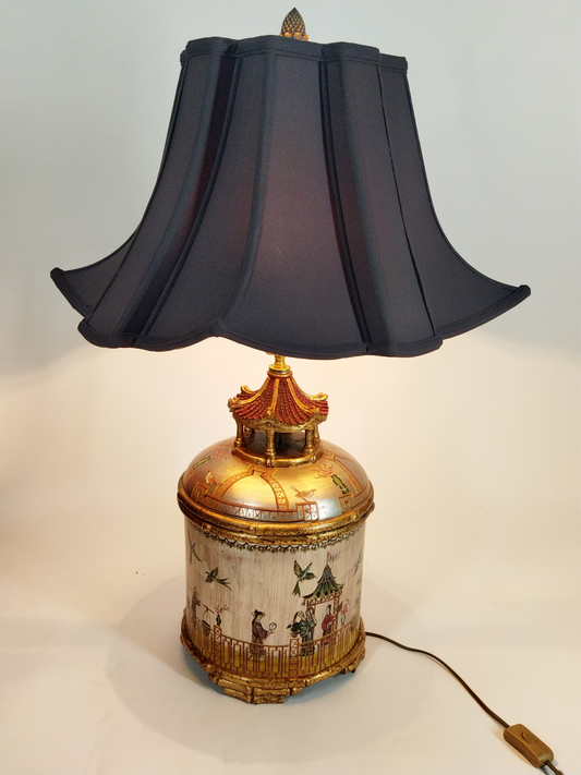 A CHINOISERIE MULTI-COLOURED HAND-PAINTED PAGODA TABLE LAMP WITH CUSTOM MADE BLACK SHADE, BASE DIAMETER 25cm, HERGHT INCLUDING SHADE 75cm.