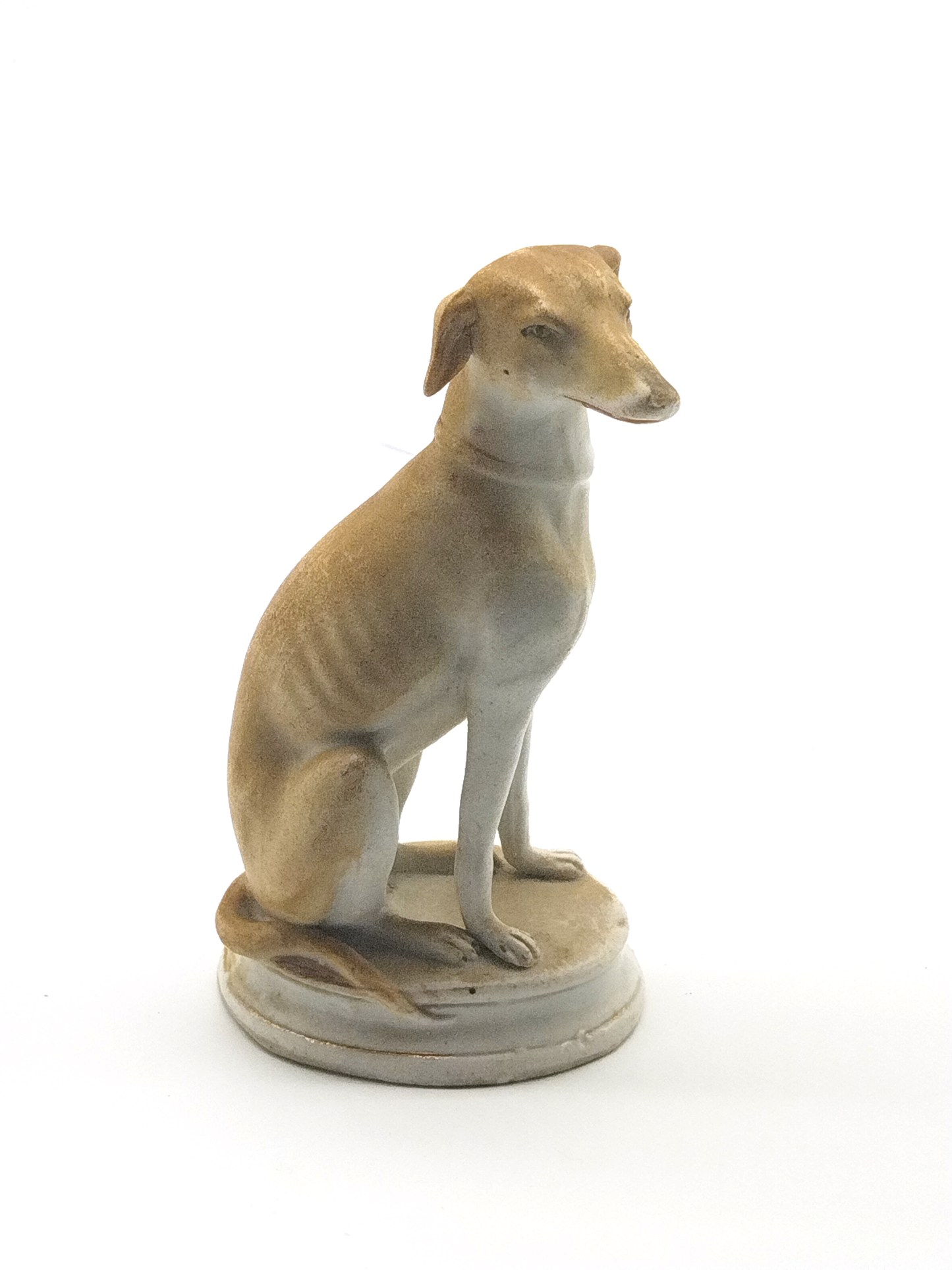 AN EARLY 19th CENTURY BISQUE GREYHOUND FIGURE, HEIGHT 14cm.