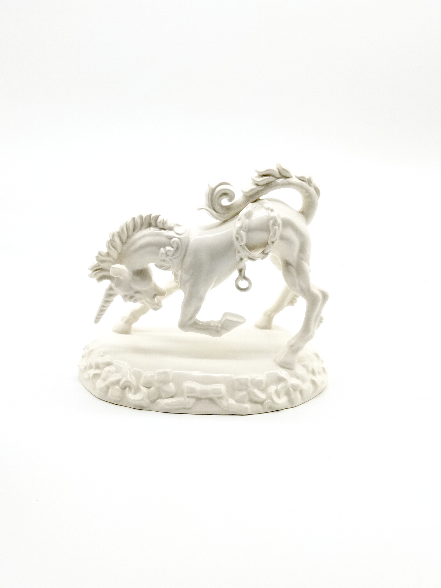 A RARE WEDGWOOD UNICORN FIGURE IN WHITE GLAZED CERAMIC, CIRCA 1950, 23 x 19cm.