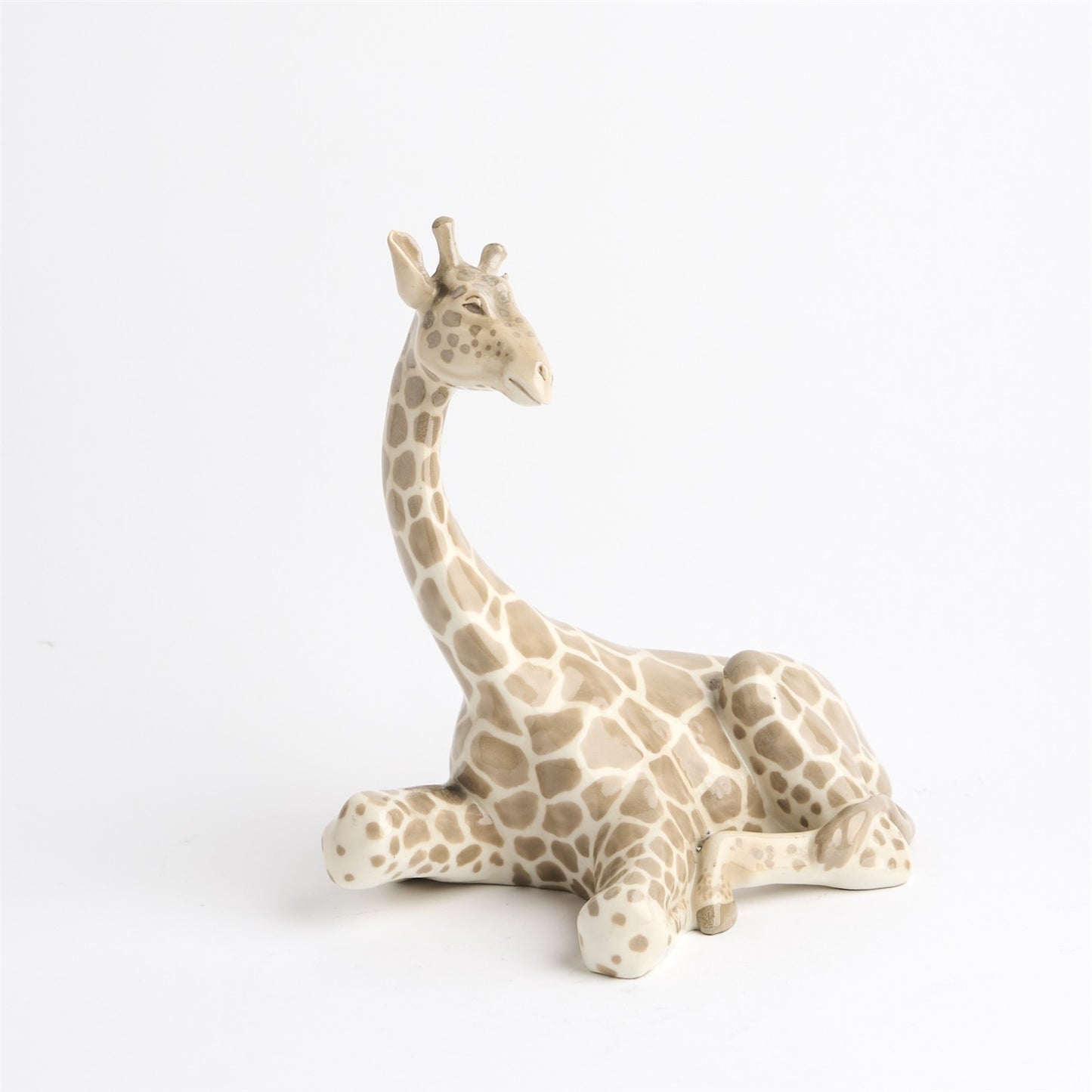 RARE ROYAL DUX CZECHOSLOVAKIA, SEATED PORCELAIN GIRAFFE FIGURE, MODEL NUMBER 411, 20 x 20 x 12cm.