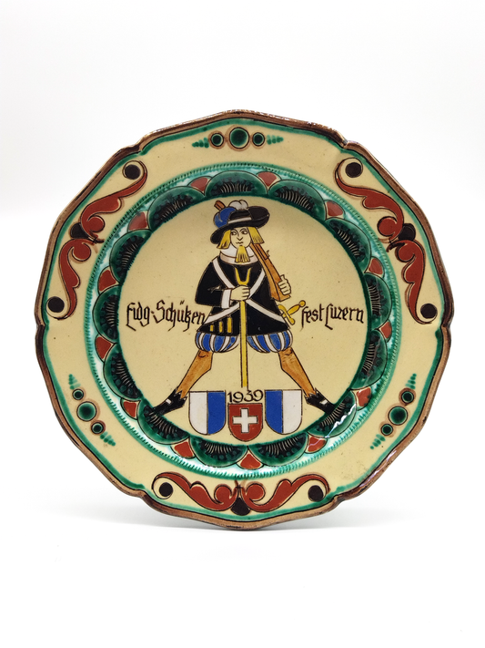 GLAZED POTTERY WALL PLATE COMMEMORATING THE EIDG SCHUTZEN FESTIVAL LUZERN, 1939, DIAMETER 89cm.