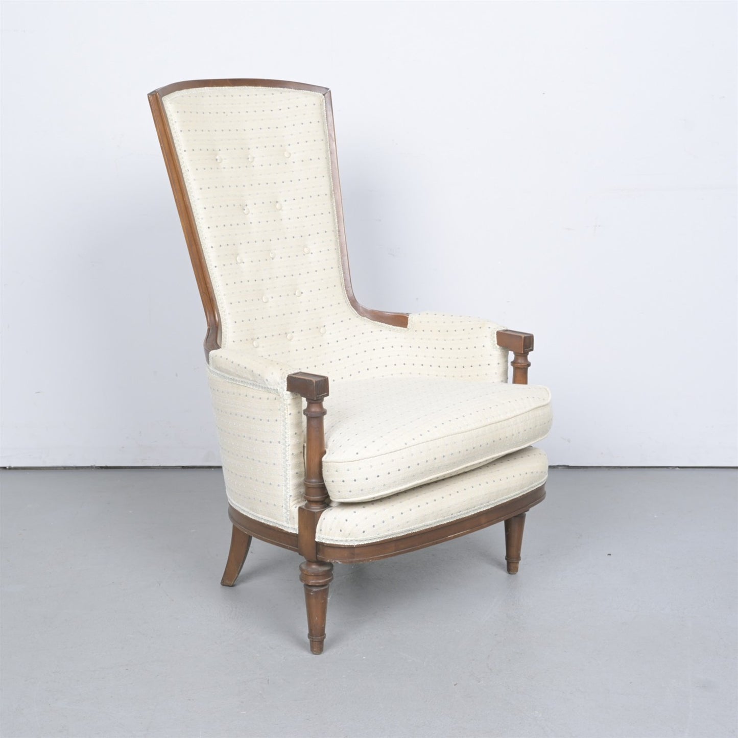 A DIRECTOIRE-STYLE UPHOLSTERED ARMCHAIR (100H X 76W X 90D CM)