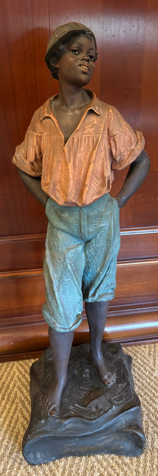 FRIEDRICH GOLDSCHEIDER (1845-1897) STYLE POLYCHROME PLASTER STAUE OF A YOUNG BOY WEARING A CAP, HEIGHT 55cm, CIRCA 1900.