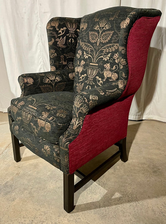 A BESPOKE GEORGIAN STYLE WINGBACK ARMCHAIR WITH LION TAPESTRY AND RED CONTRAST UPHOLSTERY, 108 x 76 x 60cm.