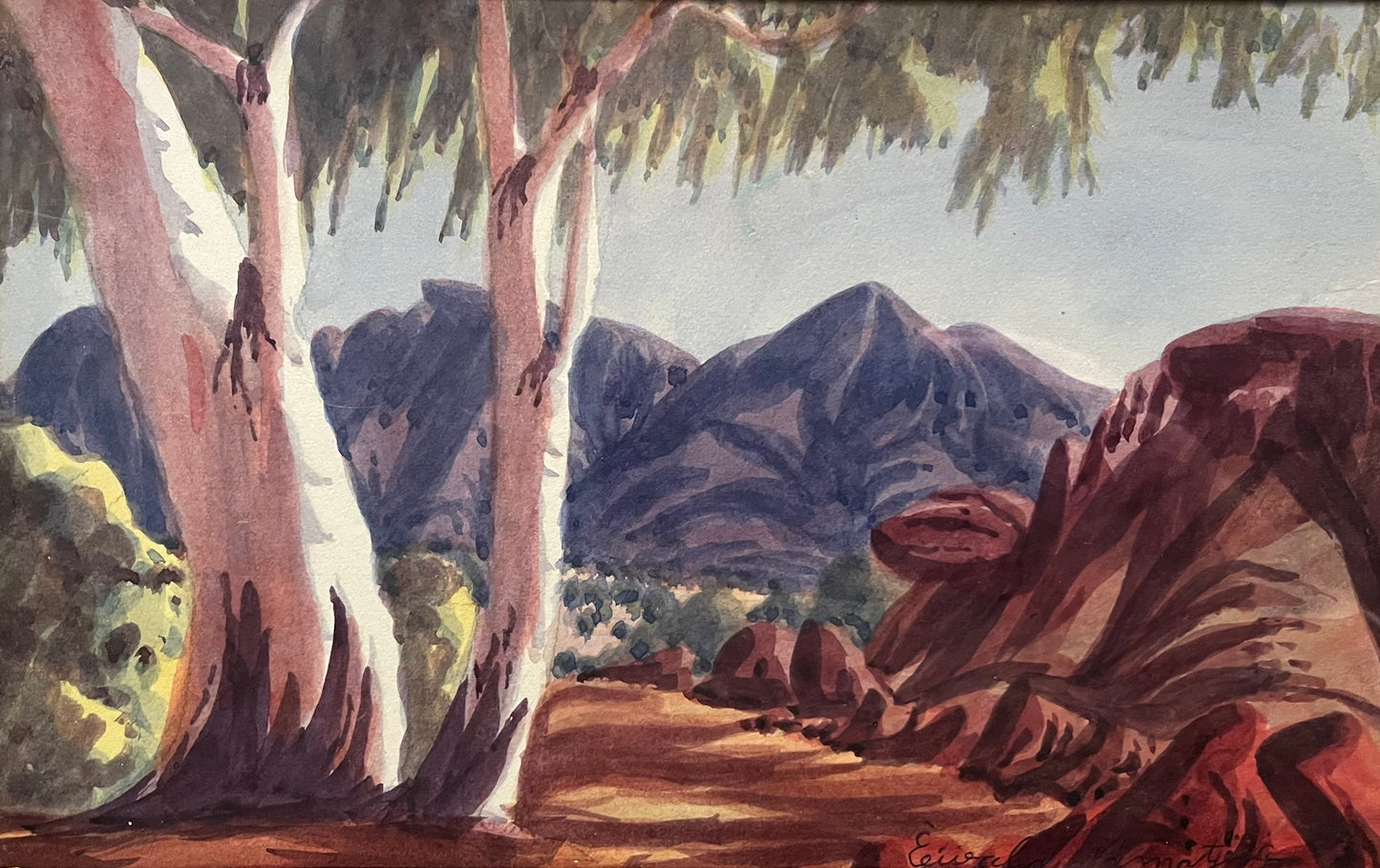 EWALD NAMATJIRA, (1930-1984),EWALD NAMATJIRA (1930-1984) MCDONNELL  RANGES WITH GHOST GUMS, WATER COLOUR, SIGNED LOWER RIGHT, IMAGE 17  x 27cm, ORIGINAL FRAME  29 X 39cm.