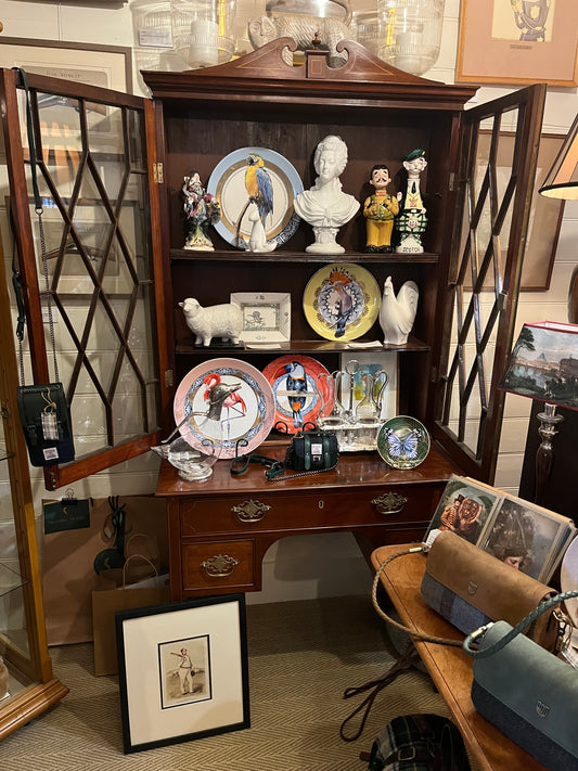 A GEORGE III CABINET ON STRAND, WITH DIAMOND MULLIONED GLAZED DOORS, DRAWS WITH BRASS HANDLES, 182 X 92 X 52cm.