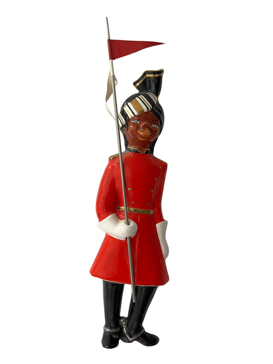 EUROPEAN CEAMIC WALL PLAQUE, INDIAN SOLDIER IN UNIFORM WITH FLAG, HEIGHT 23cm.