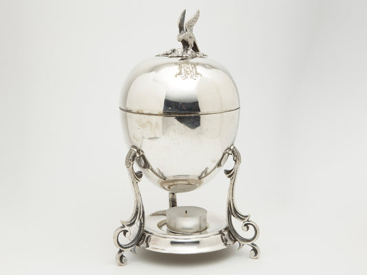 AN EDWARDIAN SILVER PLATED EGG CODDLER