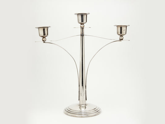 AN ART DECO SILVER PLATED THREE BRANCH CANDELABRA , CIRCA 1930