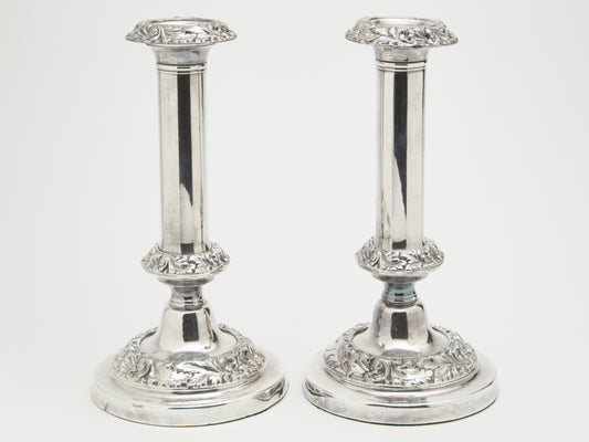 A PAIR OF VICTORIAN CANDLE STICKS