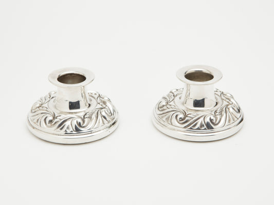 A PAIR OF RODD-HECWORTH SQUAT CANDLEHOLDERS