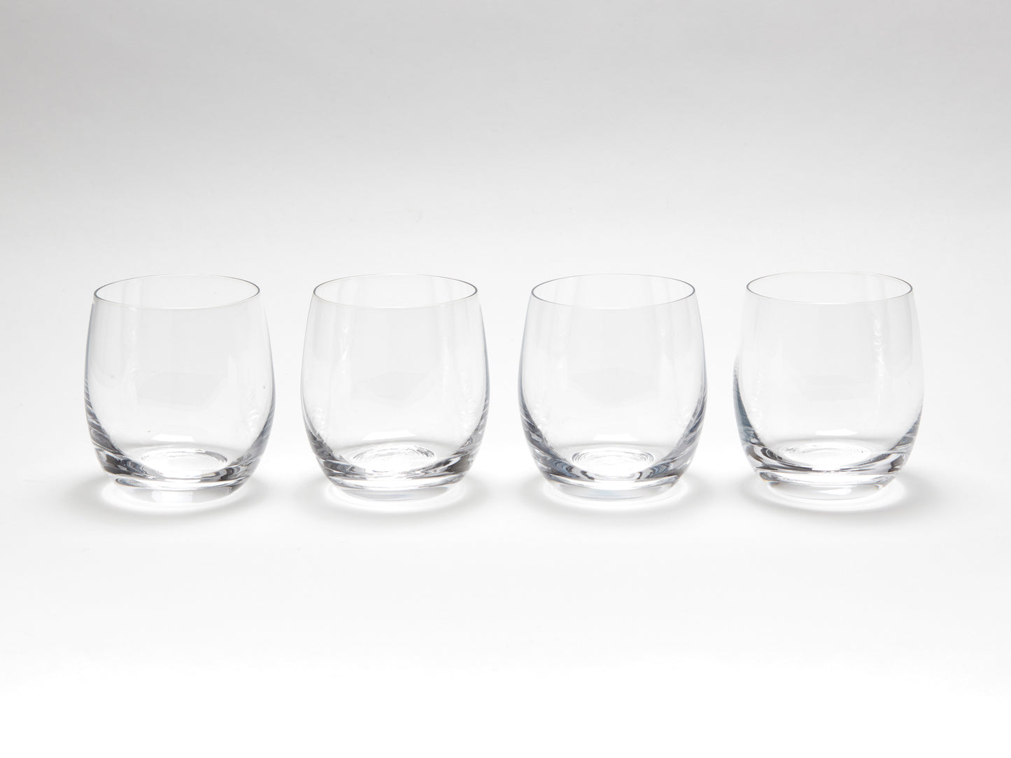 A SET OF FOUR CRYSTAL WHISKY GLASSES