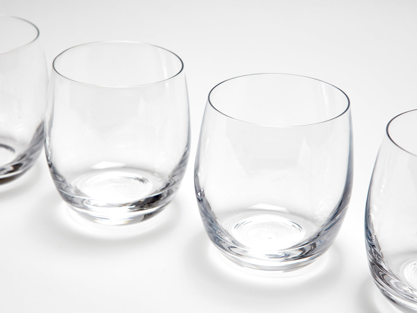 A SET OF FOUR CRYSTAL WHISKY GLASSES