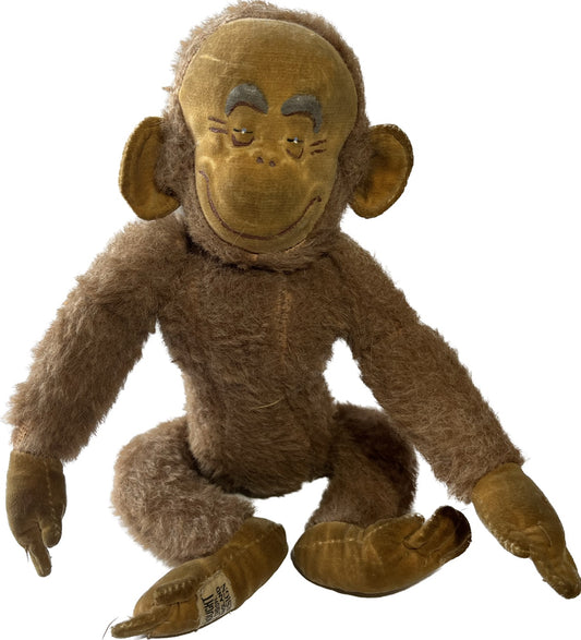 A RARE VINTAGE MERRYTHOUGHT MONKEY SOFT TOY WITH ARTICULATED HEAD, LEGS & ARMS, IRONBRIDGE, MADE IN ENGLAND, HEIGHT 30cm.