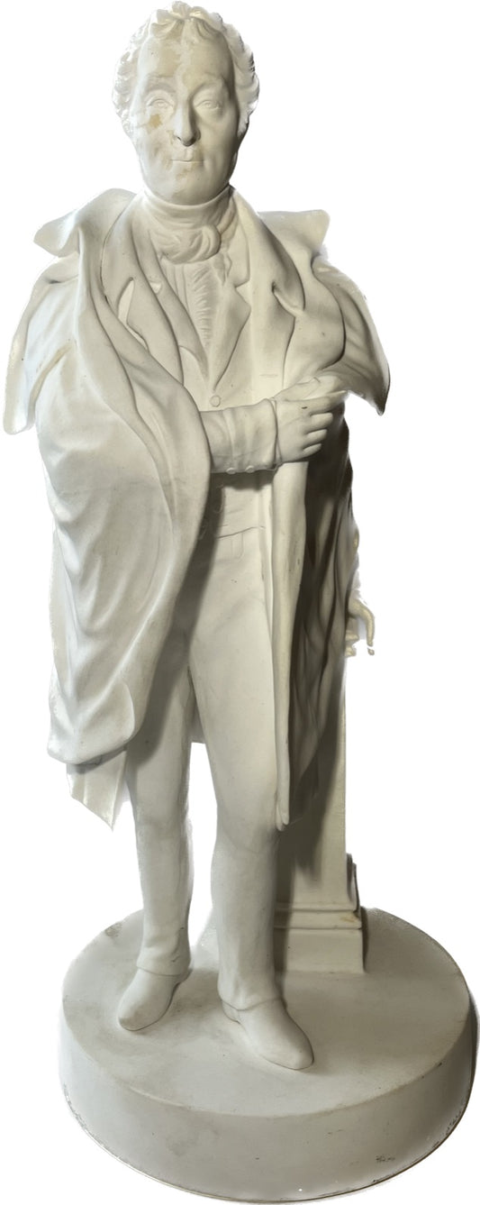 A PARIAN FIGURE OF THE DUKE OF WELLINGTON, HEIGHT 29cm.